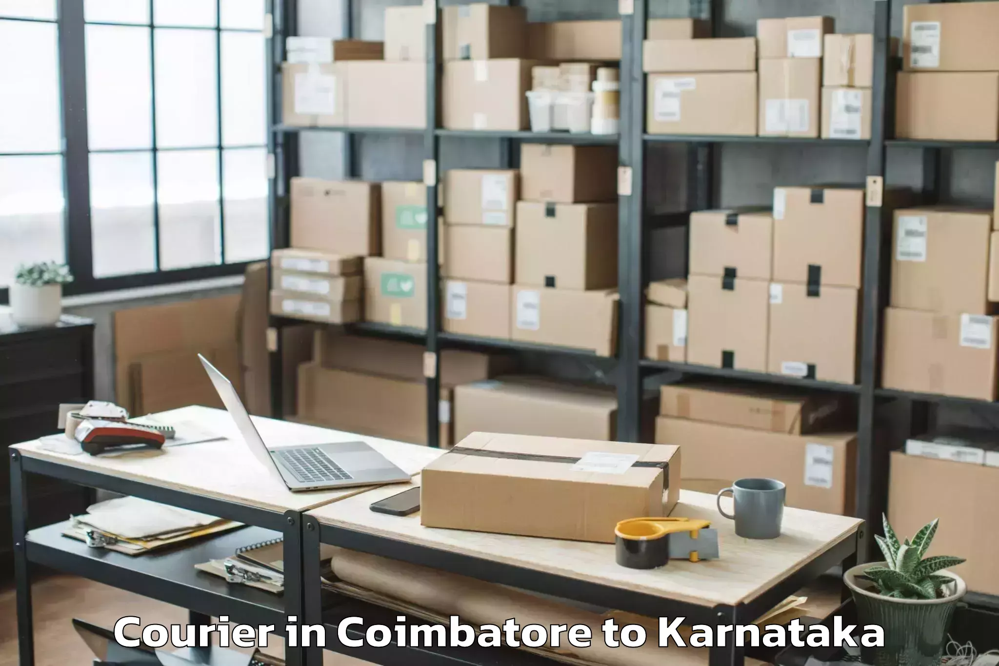 Reliable Coimbatore to Bellur Courier